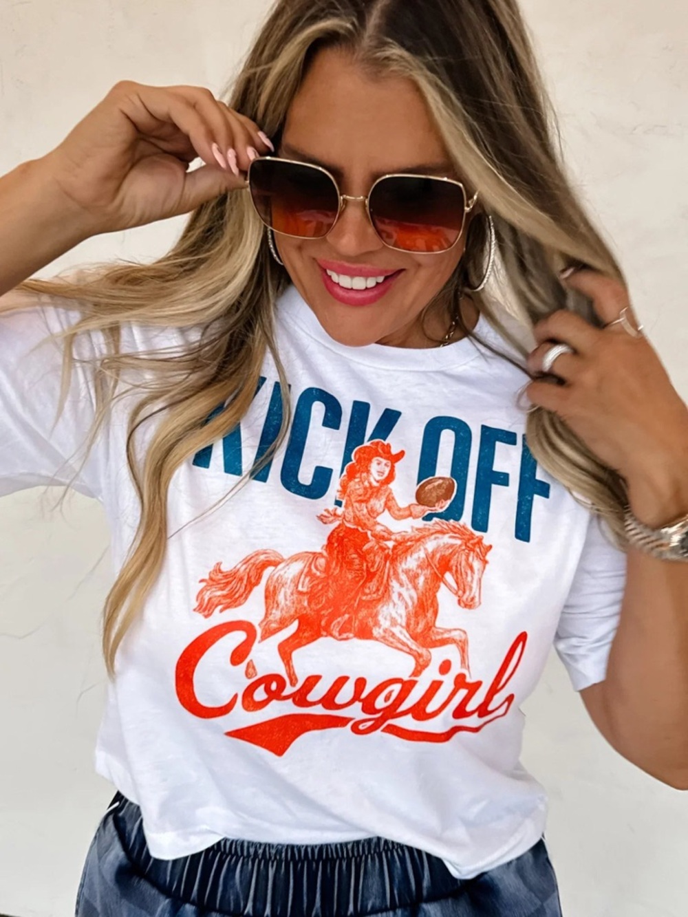 Kick Off Cowgirl Short Sleeve Tee - White with Orange & Teal Graphic